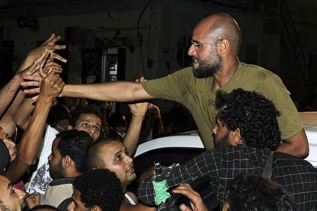 Saif Al-Islam, son of Moammer Gadhafi, greets supporters in Tripoli
